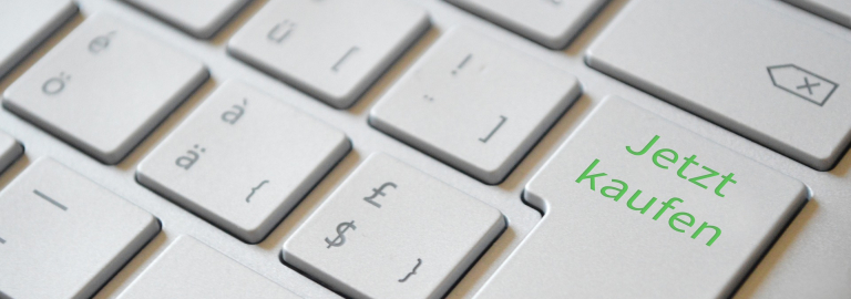 Laptoptastatur mit Tastenbeschriftung "Jetzt kaufen"